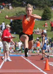 Sam Renter triple jumps at the 2008 state meet.